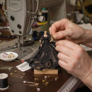Spriteveil atelier - hands sewing miniature gothic dress